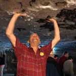 Jim holding up Turda Salt Mine ceiling